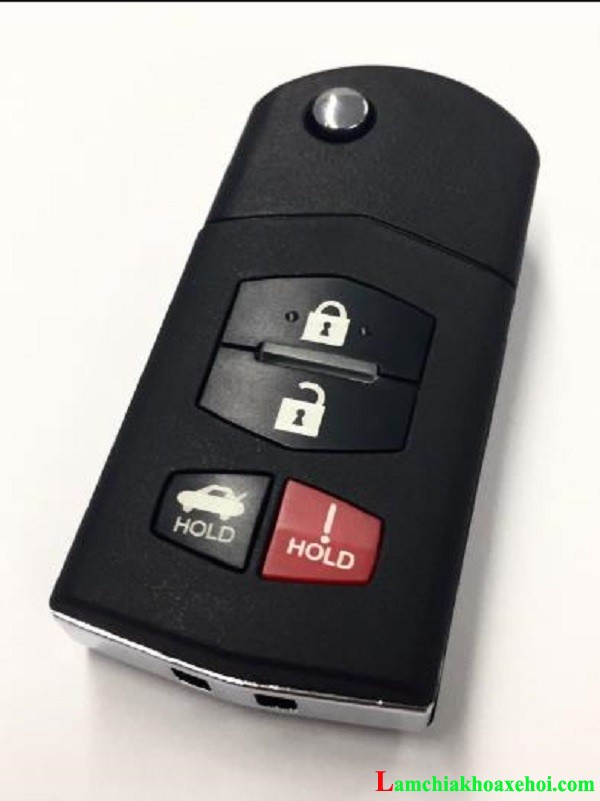 nút hold trên chìa khóa ô tô Mazda